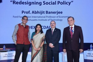 (L-R): Professor Abhijit Banerjee, Ford Foundation International Professor of Economics at Massachusetts Institute of Technology; Ms. Latha Venkatesh, Executive Editor, CNBC TV 18;  Mr David Rasquinha, MD, EXIM Bank and Mr. Debasish Mallick, DMD, EXIM Bank at the EXIM Bank's 34th Commencement Day Annual Lecture - Photo By Sachin Murdeshwar GPN News Network 