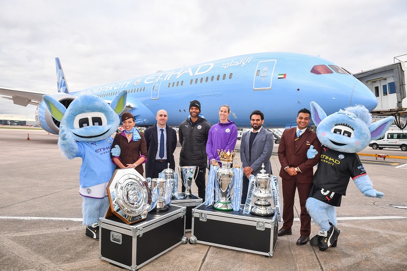 The aircraft was welcomed into Manchester by (left to right) Omar Berrada, Chief Operating Officer for Manchester City, City legend Joleon Lescott, Yasser Al Yousuf, Vice President Commercial Partnerships, Etihad Aviation Group, Karan Bardsley and mascots.  The new liveried aircraft landed in Abu Dhabi on Friday, 18 October -Photo By Sachin Murdeshwar GPN