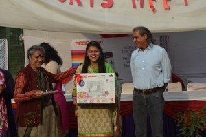 Winner - Kajol, 2nd Year Economic Honours student of LSR College presented with Usha Janome Sewing machine by Mr. Krishna Shriram, Executive Chairman, Usha International