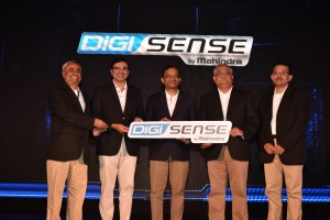 Dr. Pawan Goenka, Executive Director, M&M Ltd (centre) with other senior company officials at the launch of Mahindra’s Connected Vehicles Technology Platform - DiGiSENSE.