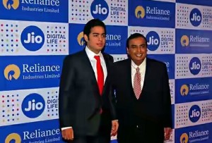Mukesh Ambani (R), chairman of Reliance Industries Ltd, poses with his son Akash before addressing the company's annual general meeting in Mumbai, India September 1, 2016 