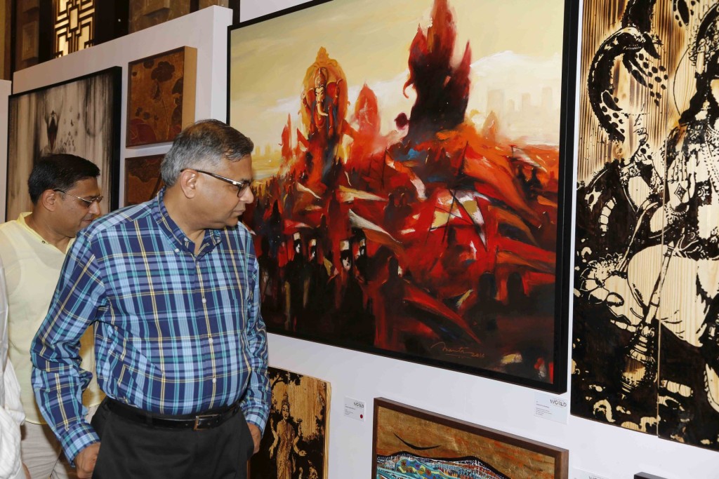 Natarajan Chandrashekharan of Tata Group browsing through the art on display - Photo By Sachin Murdeshwar GPN NETWORK. 