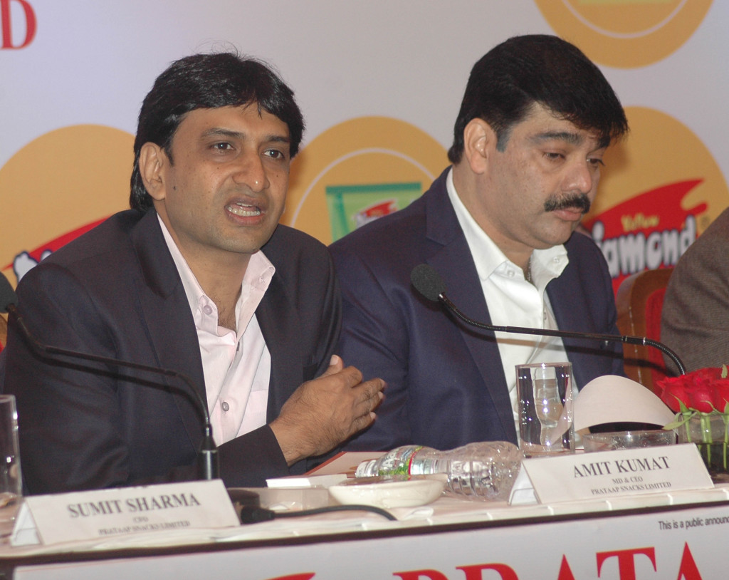From L : Amit Kumat, MD & CEO, Prataap Snacks Limited addressing the gathering at the Prataap Snacks Limited IPO Press Conference with Arvind Mehta, Chairman and Executive Director of Prataap Snacks Ltd - Photo By Sachin Murdeshwar GPN NETWORK