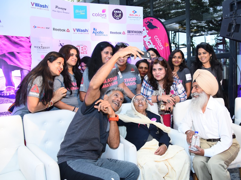 Pinkathon founder Milind Soman takes a selfie with 101-year-old Mann Kaur, an Indian track – and – field athlete who holds the world record in the over 100 years old categories and Pinkathon Ambassadors. He formally announced the launch of the Sixth Edition of COLORS Pinkathon Mumbai 2017 to be held on December 17, 2017 at MMRDA Grounds, BKC Mumbai - Photo By Sachin Murdeshwar GPN NETWORK