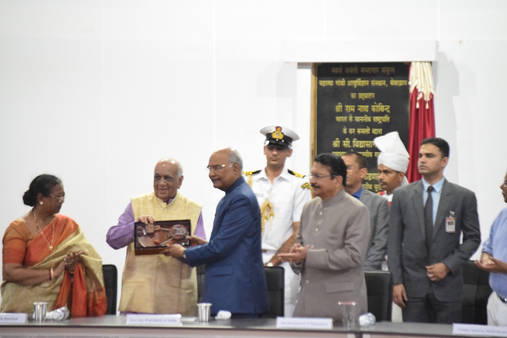Sh. Dhirubhai Mehta, Secretary of Kastuba Health Society felicitating The President of India Sh. Ram Nath Kovind on the occasion of  Golden Jubilee celebrations of Mahatma Gandhi Institute of Medical Sciences (MGIMS), Wardha on 17 August 2019. 