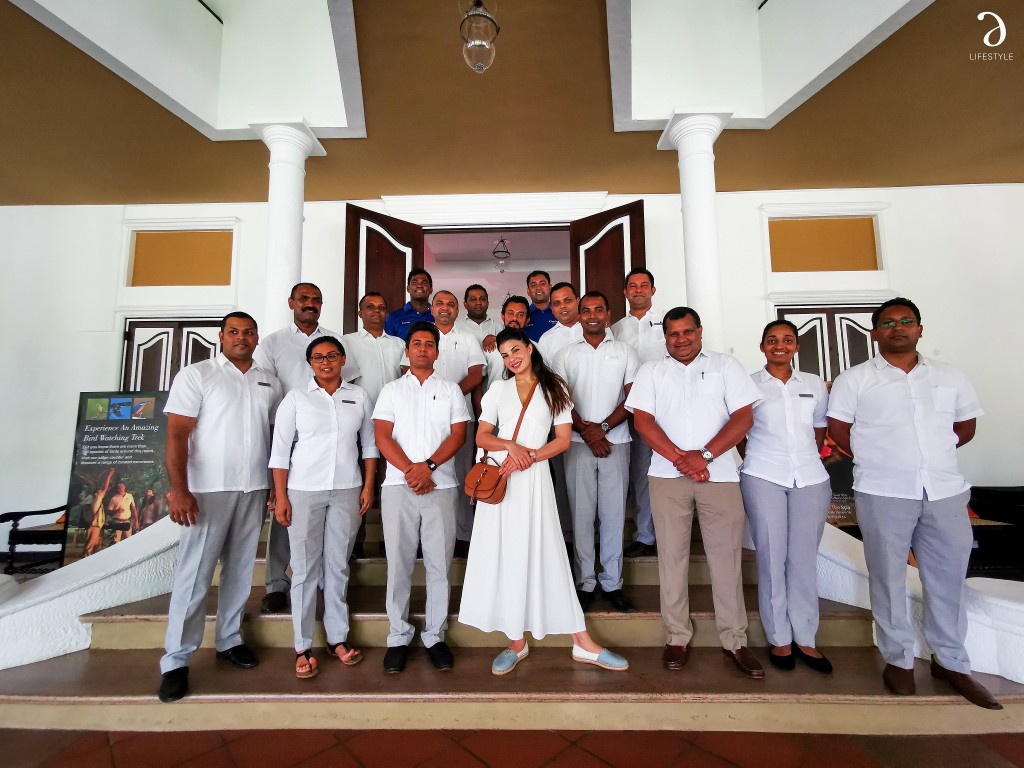 Jacqueline Fernandez with the staff at Cinnamon Lodge Habarana