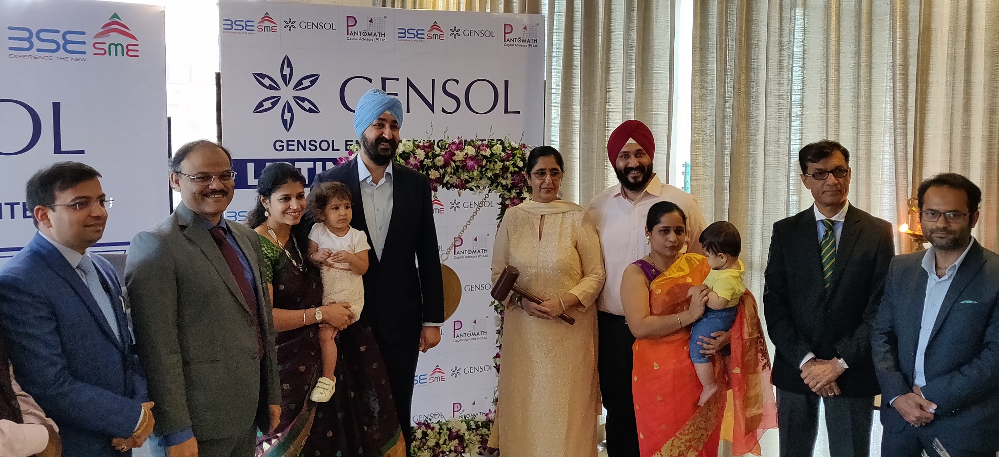 Management of Gensol Engineering Ltd., Mr. Anmol Singh Jaggi (MD & Chairman) and Mr. Puneet Singh Jaggi (Director) with family member were present at the Gensol Engineering Ltd. listing ceremony held today at the BSE, Ahmedabad.-Photo By GPN 