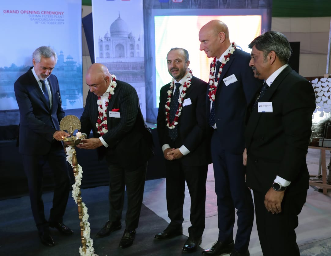 His Excellency Mr. Lorenzon Angeloni, Italian Ambassador to India, Mr. Giorgio Girondi, Chairman, UFI Filters Group, Rinaldo Facchini, Chief Executive Officer, UFI Filters Group, Mr Luca Betti, UFI Group Aftermarket Director and Mr. Hridesh Sharma, CEO, UFI Filters India lighting the lamp at the inauguration of Sofima Filters India Pvt. Ltd, the first aftermarket dedicated plant of UFI Filters in the world.-Photo By GPN
