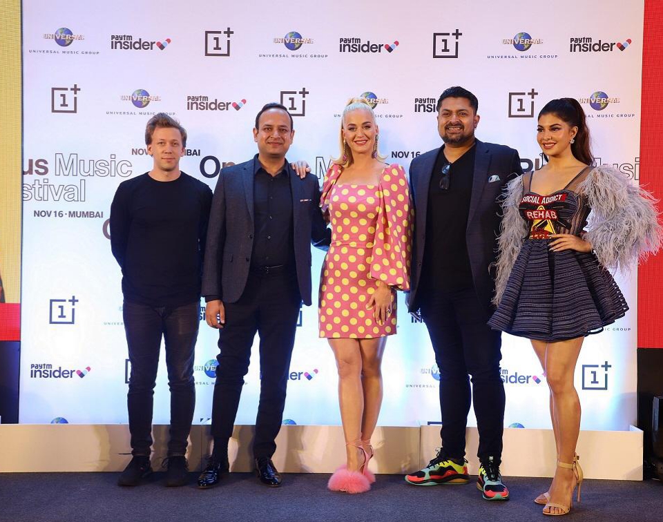 From L-R: Tilen Pigac, Head of Community, OnePlus India, Vikas Agarwal, General Manager, OnePlus India, Pop sensation and singer Katy Perry, Devraj Sanyal, MD & CEO of Universal Music Group, India and South Asia, Bollywood actress Jacqueline Fernandez, in Mumbai - Photo By Sachin Murdeshwar GPN