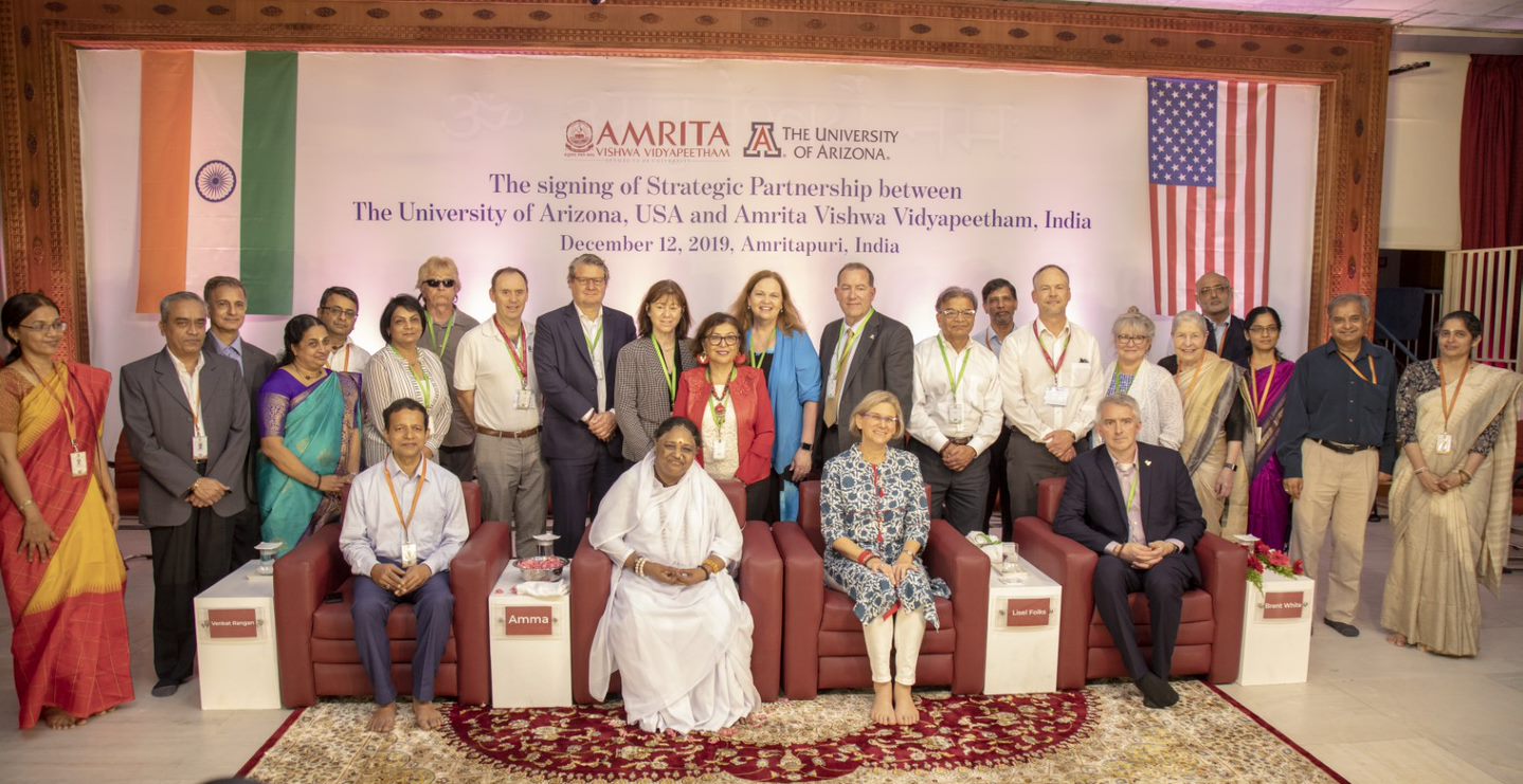 Mata Amritanandamayi Chancellor Amrita Vishwa Vidyapeetham and Dr. Lisel Folks, Provost and Vice President of Academic Affairs, University of Arizona at the letter of intent signing ceremony -Photo By Sachin Murdeshwar GPN