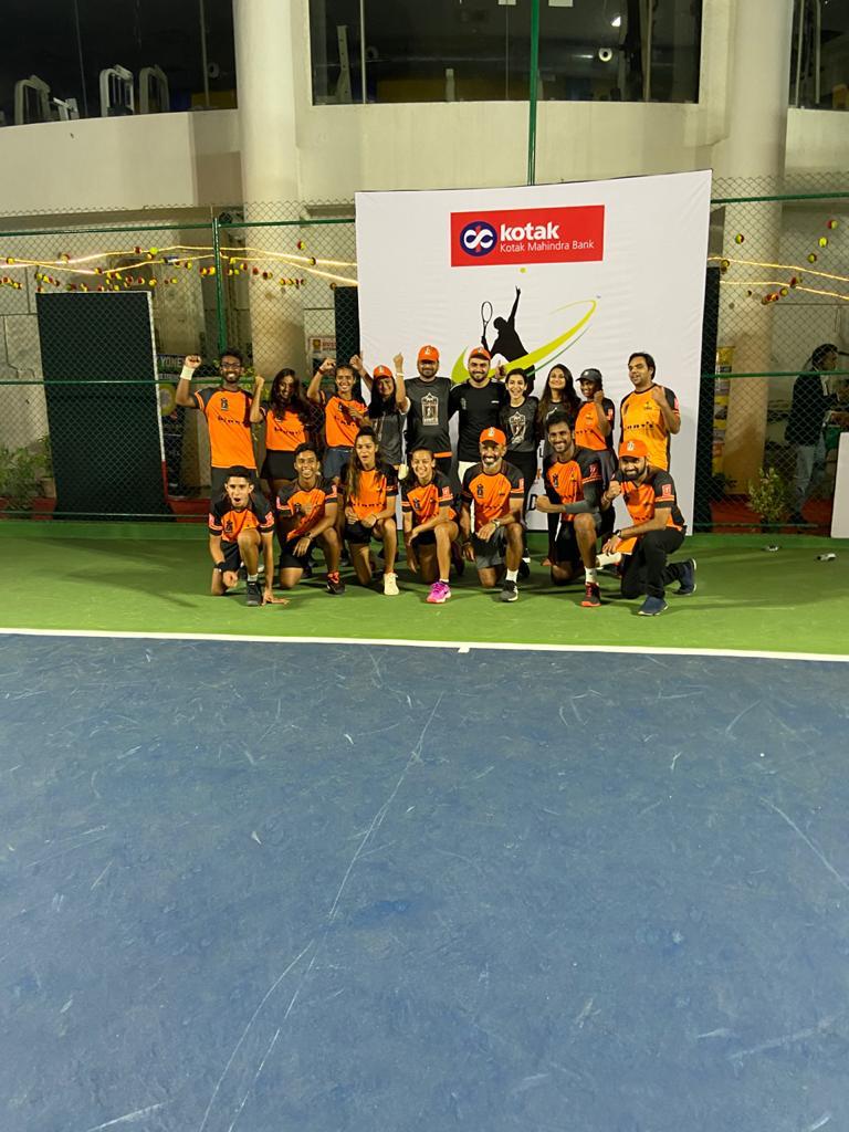 Table Toppers Pune Warriors pose after their 2nd win at the 2nd Kotak Mahindra Bank Tennis Premier League played at the Celebration Sports Club in Andheri here on Saturday.
