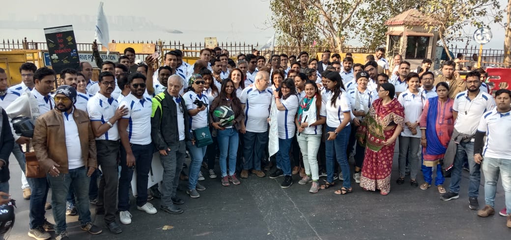 Dr Boman Dhabhar in centre of the rally team