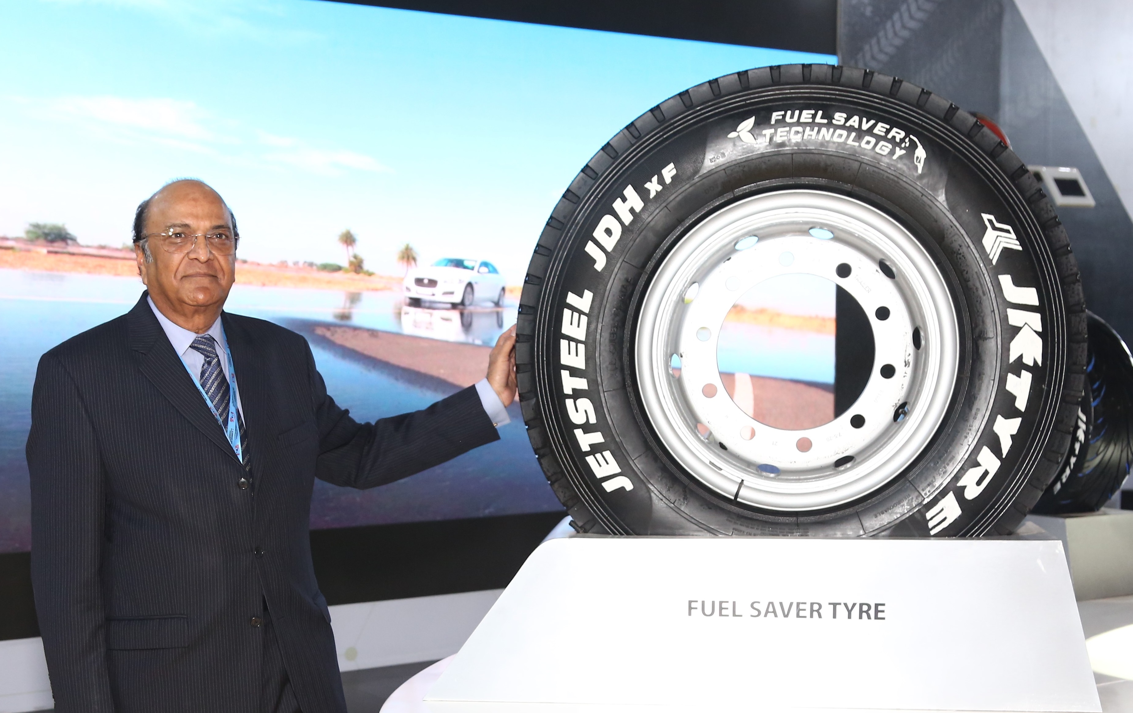 Dr. Raghupati Singhania, Chairman & Managing Director, JK Tyre & Industries Ltd. with Fuel Saver TBR tyre -Photo By GPN