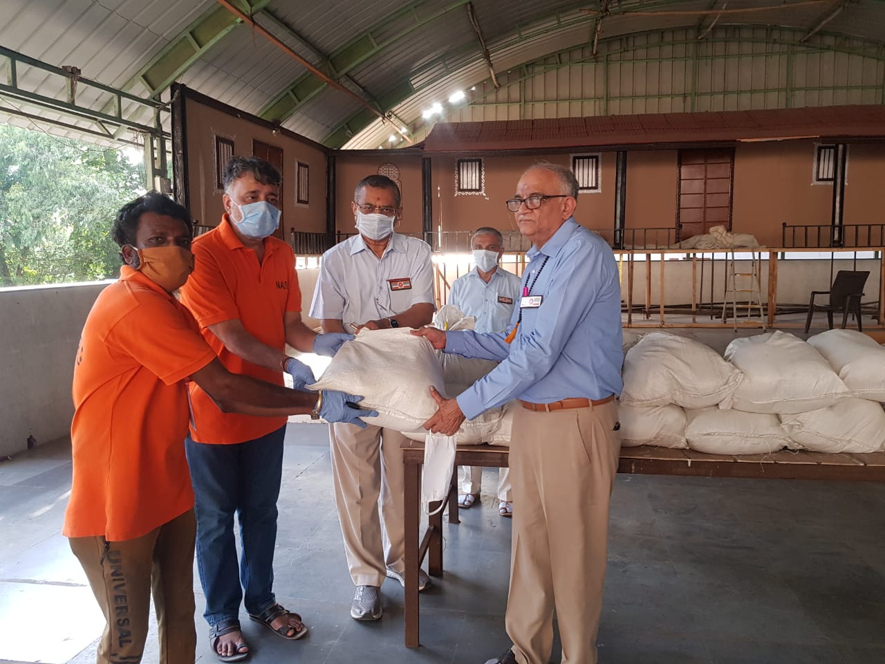 Yogi Divine Society team distributing Ration Packets to help poor and needy in Covid 19 Crisis.