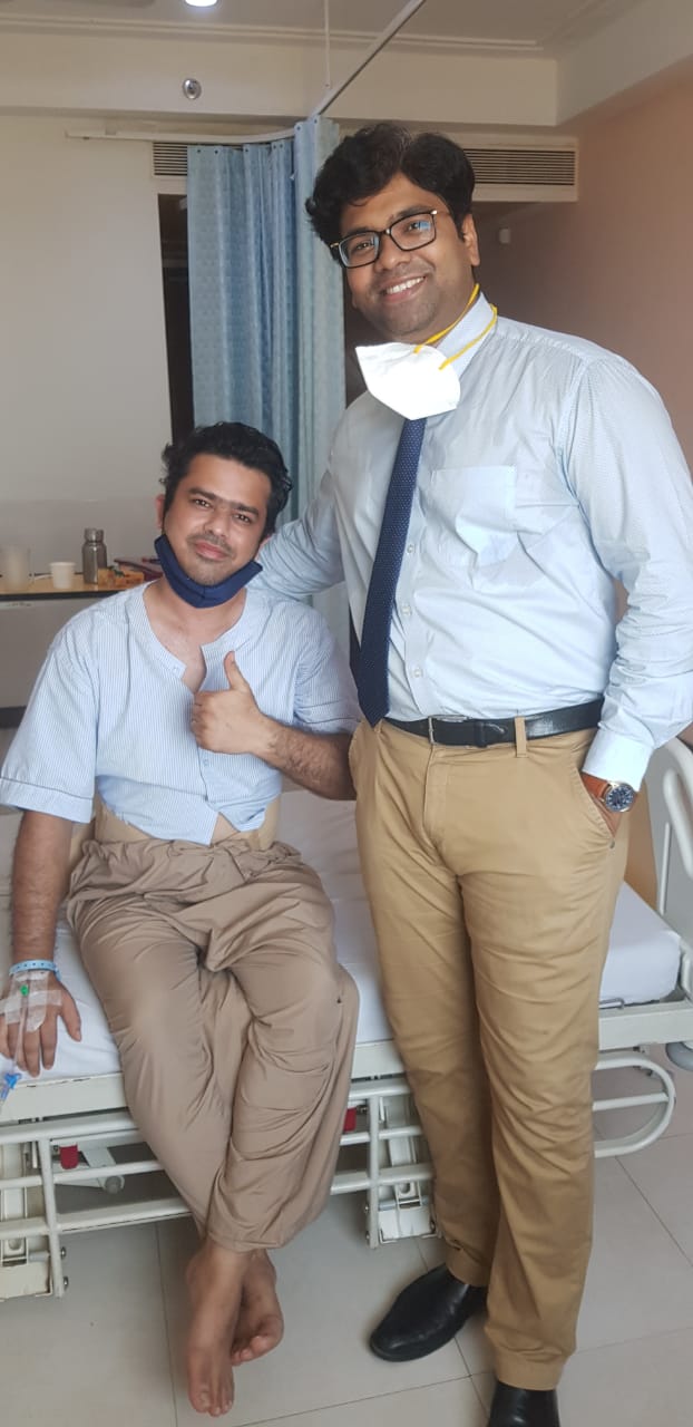 Dr. Girish L. Bhalerao, Consultant Orthopaedic Joint Replacement(Arthroplasty), Sports Medicine (Arthroscopy) & Spine Surgeon, Wockhardt Hospital, Mira Road with the Patient - Photo By GPN