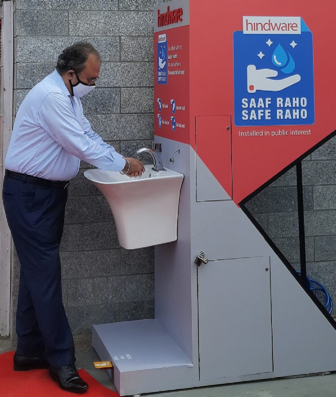 Mr. Sanjay Kalra, Chief Executive Officer, Bath Products & Tiles, Brilloca Limited inaugurates the new Hindware Contactless Handwashing System in the National Capital Region -Photo By GPN