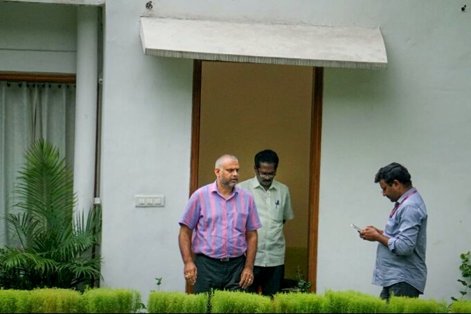 Enforcement Directorate (ED) officials outside the residence of MP Magunta Sreenivasulu Reddy during a raid as part of a money laundering investigation into alleged irregularities in the now-scrapped Delhi Excise Policy 2021-22, in New Delhi, Friday, Sept. 16, 2022.