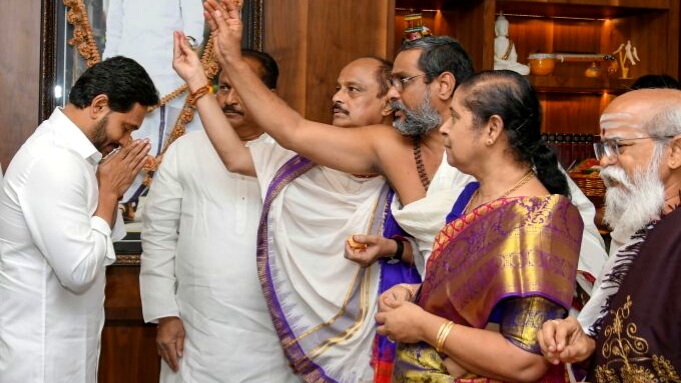 Andhra Pradesh Chief Minister YS Jagan Mohan Reddy seeks blessing from priests of Sri Durga Malleswara Swamy Varla Devasthanam Temple, at his camp office in Tadepalle, Friday, Sept. 16, 2022.