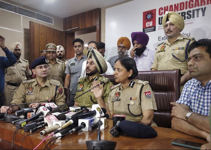 Inspector General of Police Gurpreet Deo with senior police officers addresses a press conference after objectionable videos of several women students were allegedly posted on social media, at the Chandigarh University in Mohali, Sunday, Sept. 18, 2022. A woman student who was allegedly involved in sharing the video online has been apprehended.